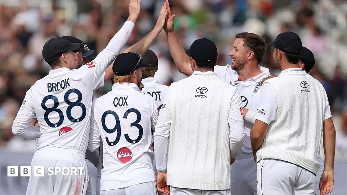 Cricket team celebrating a wicket on field Cricket team celebrating a wicket on field