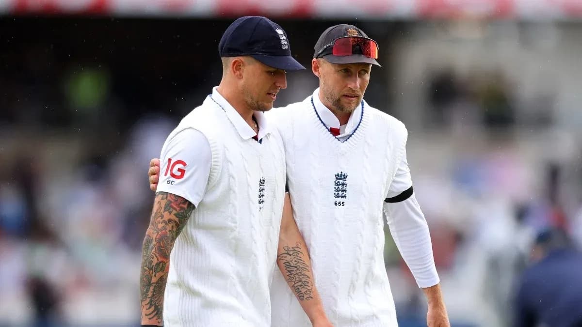 Two England cricket players walking off the field Two England cricket players walking off the field
