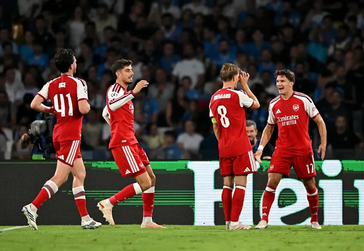 Arsenal players celebrating a goal during match Arsenal players celebrating a goal during match