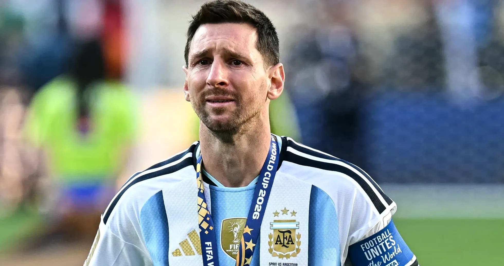 Lionel Messi wearing Argentina jersey with World Cup medal Lionel Messi wearing Argentina jersey with World Cup medal