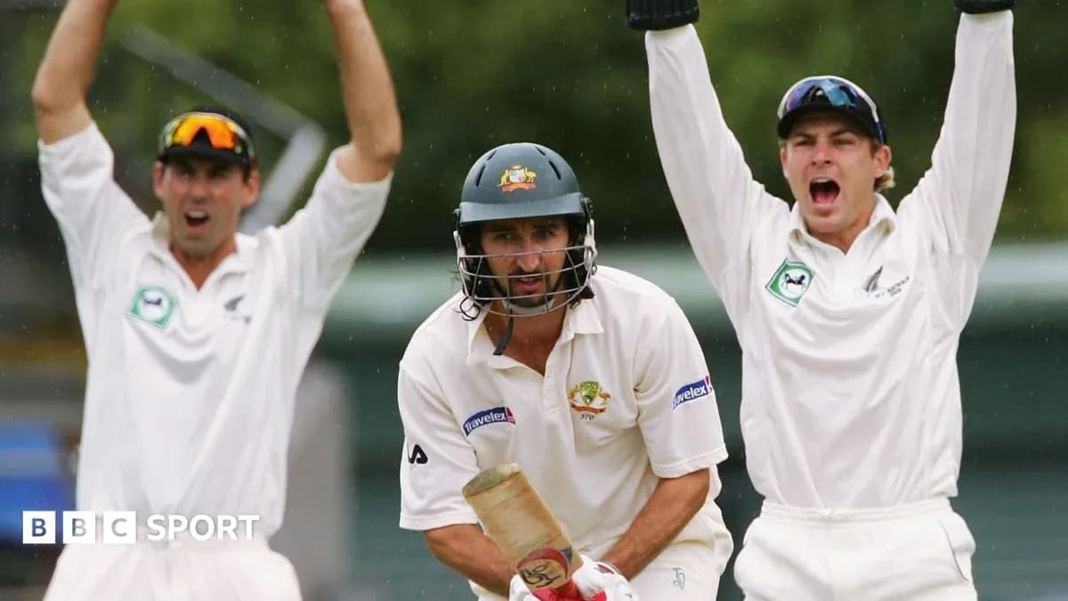 Cricketers celebrating a wicket during a match Cricketers celebrating a wicket during a match