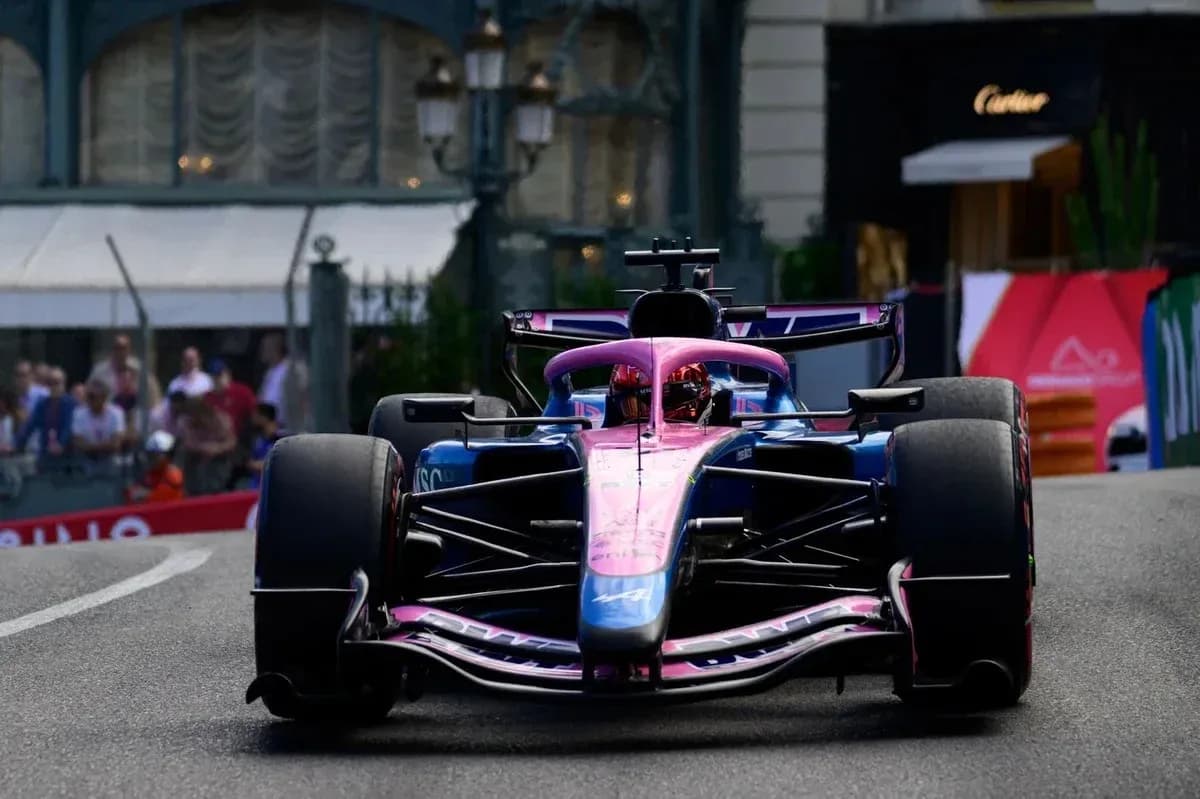 Formula 1 car racing on a street circuit Formula 1 car racing on a street circuit