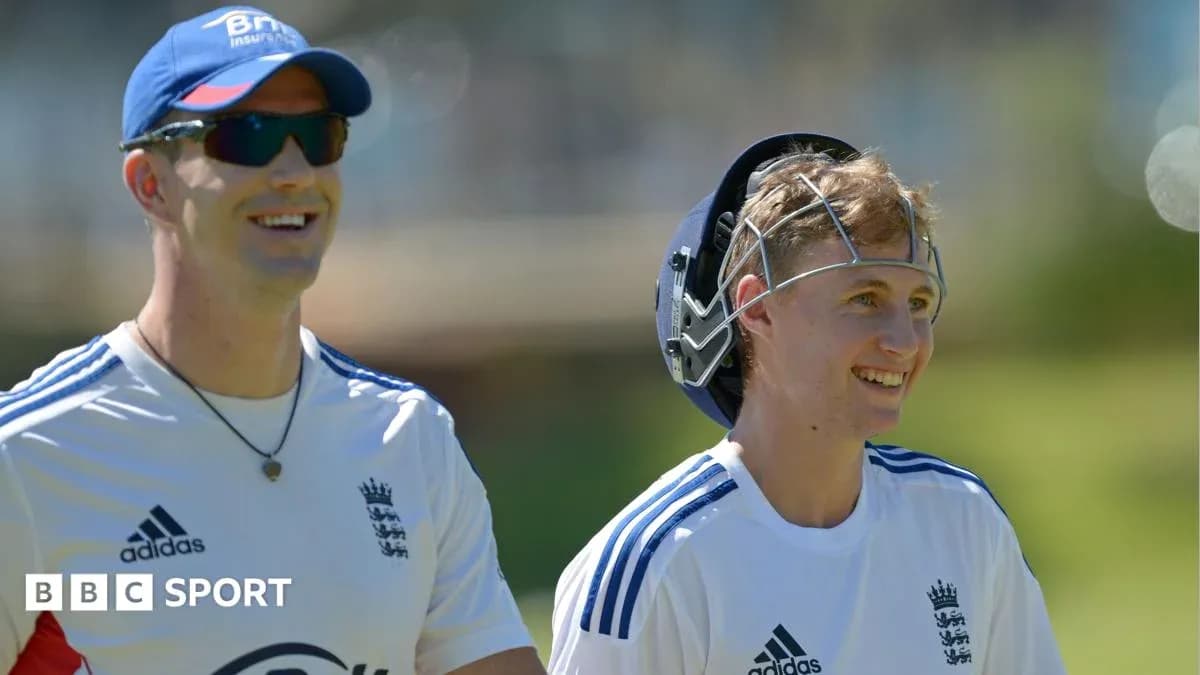 Two cricketers smiling during practice session Two cricketers smiling during practice session