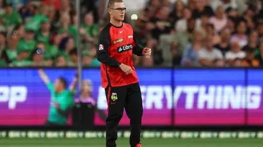 Player preparing to bowl during cricket match Player preparing to bowl during cricket match