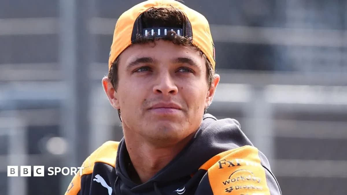Driver wearing McLaren team gear at event Driver wearing McLaren team gear at event