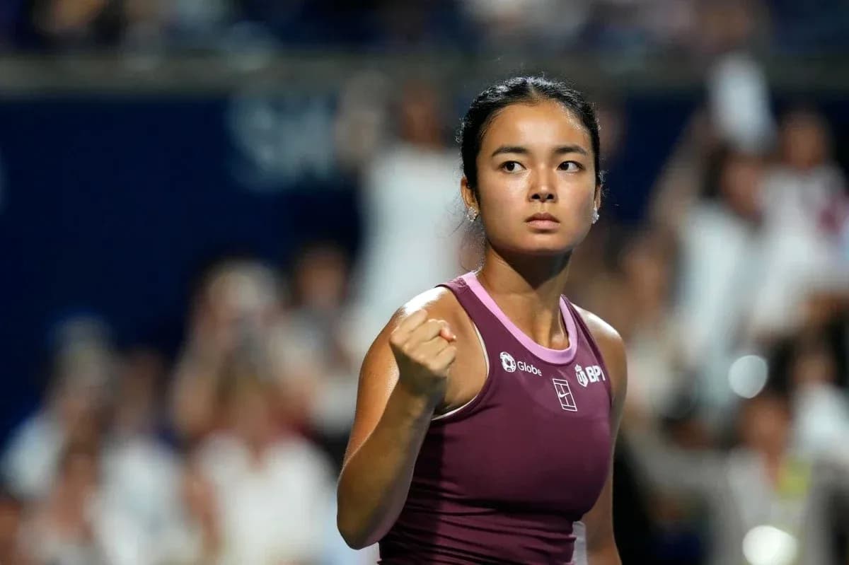 Tennis player celebrating a point during match Tennis player celebrating a point during match
