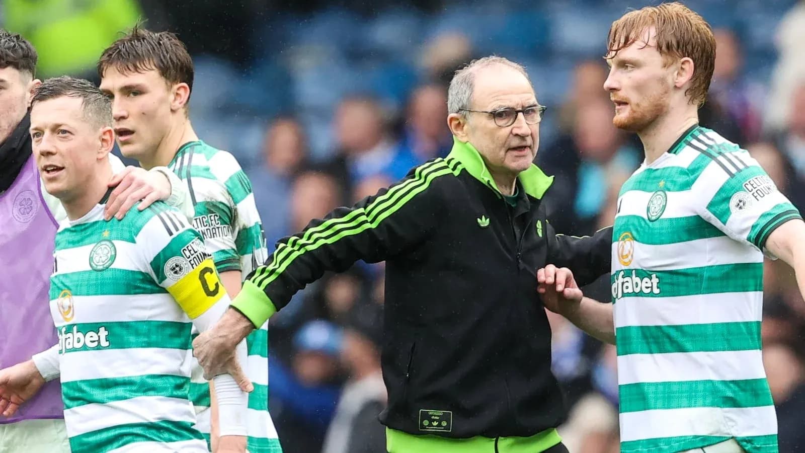 Celtic players and manager discussing during match Celtic players and manager discussing during match