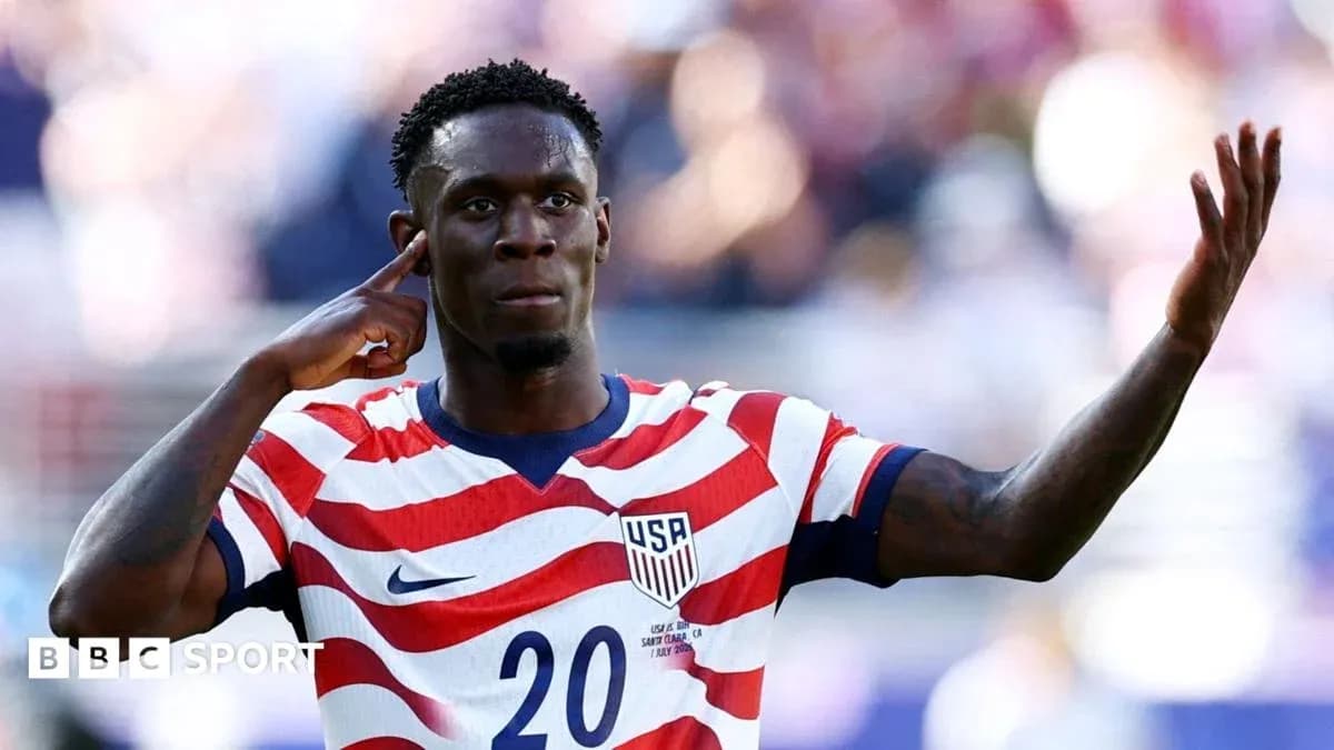 Player celebrating with hand gesture in USA jersey Player celebrating with hand gesture in USA jersey