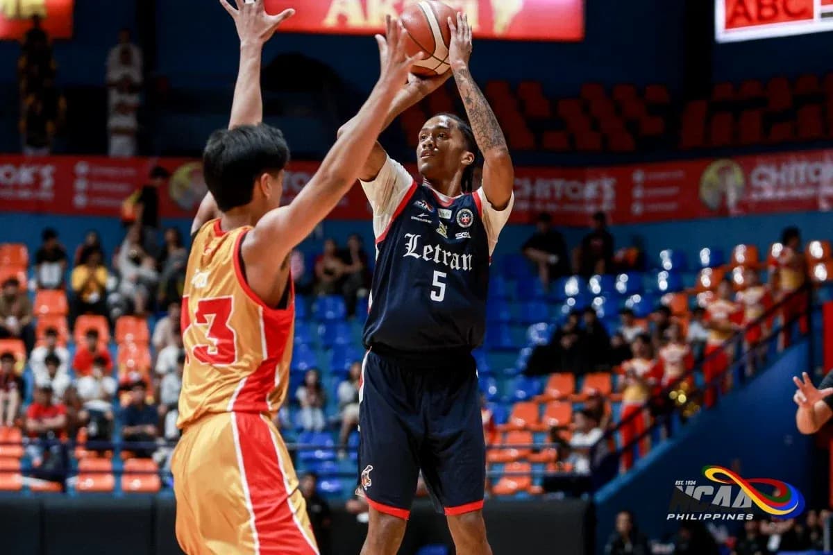 Player shooting the basketball during a game Player shooting the basketball during a game