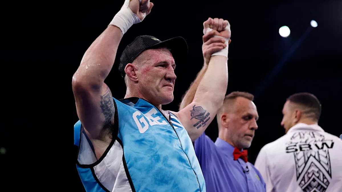Boxer celebrating victory with referee after match Boxer celebrating victory with referee after match