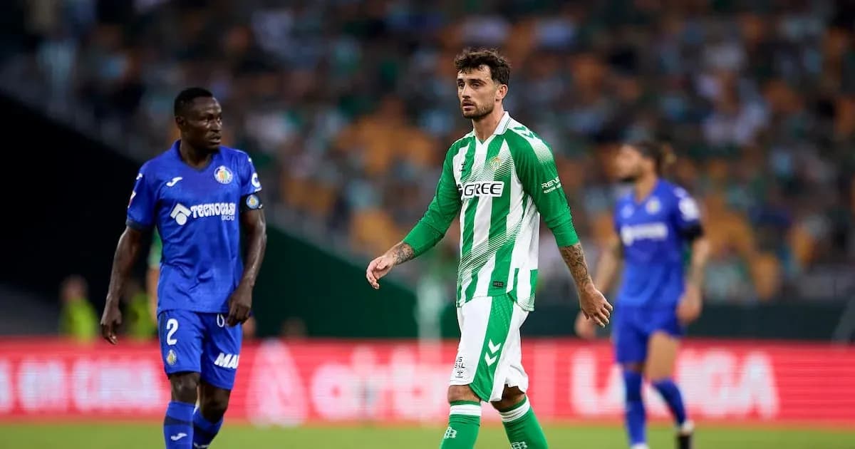 Two players on the field during a match Two players on the field during a match