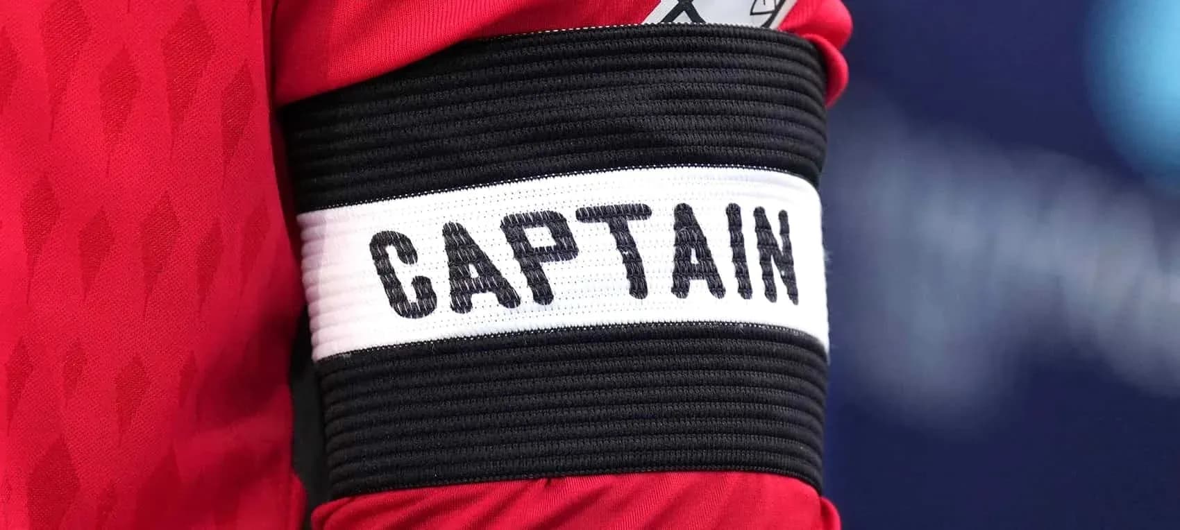 Close-up of captain's armband with 'CAPTAIN' label Close-up of captain's armband with 'CAPTAIN' label