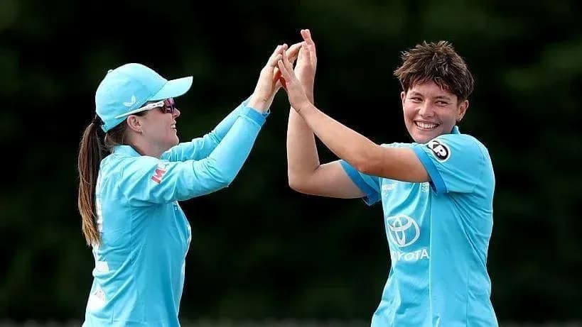 Two players celebrating after a successful play Two players celebrating after a successful play