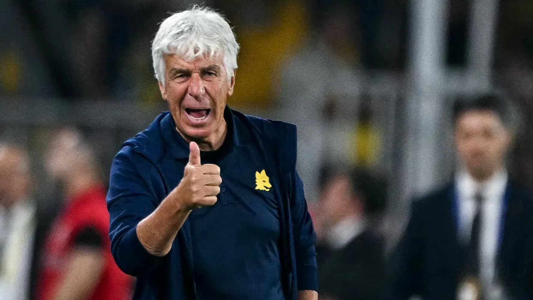 Coach giving thumbs up during match Coach giving thumbs up during match