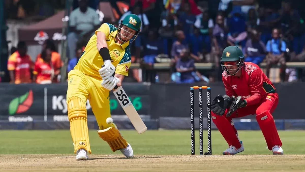 Batsman hitting the ball with wicketkeeper ready Batsman hitting the ball with wicketkeeper ready