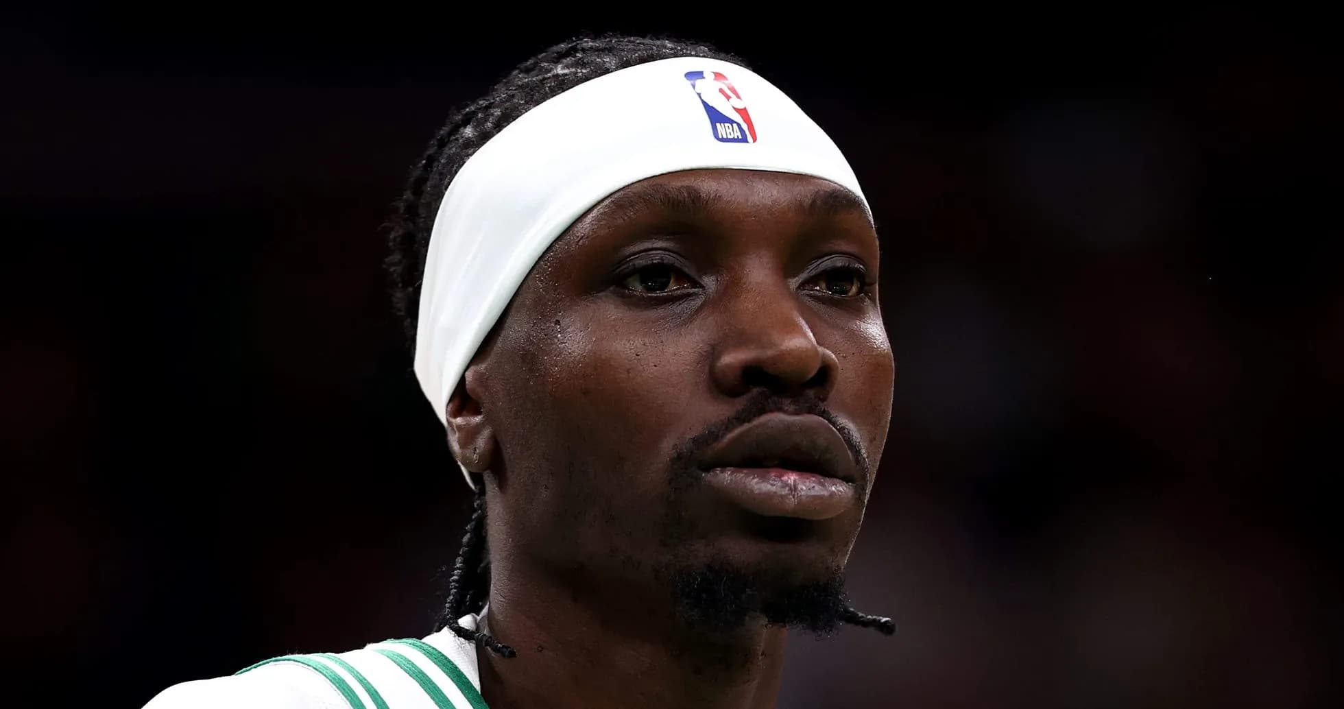 Basketball player wearing a headband during game Basketball player wearing a headband during game