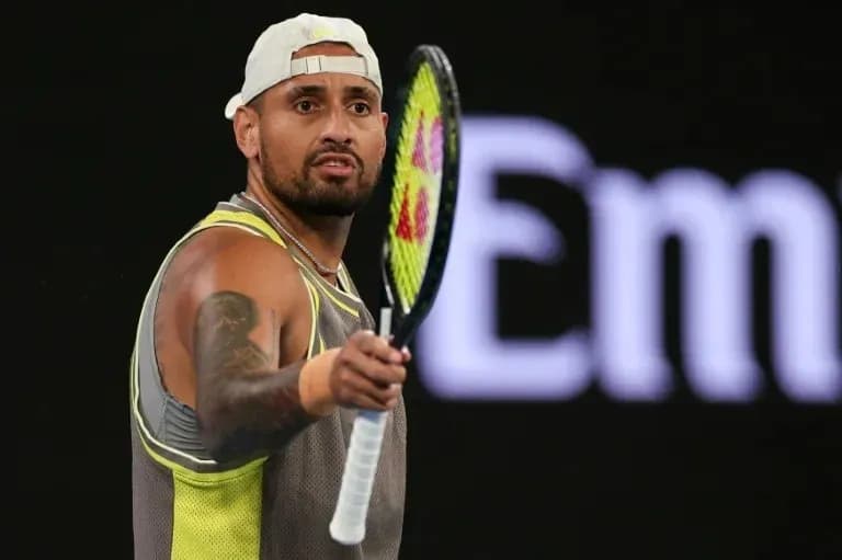 Tennis player holding racket during match action Tennis player holding racket during match action