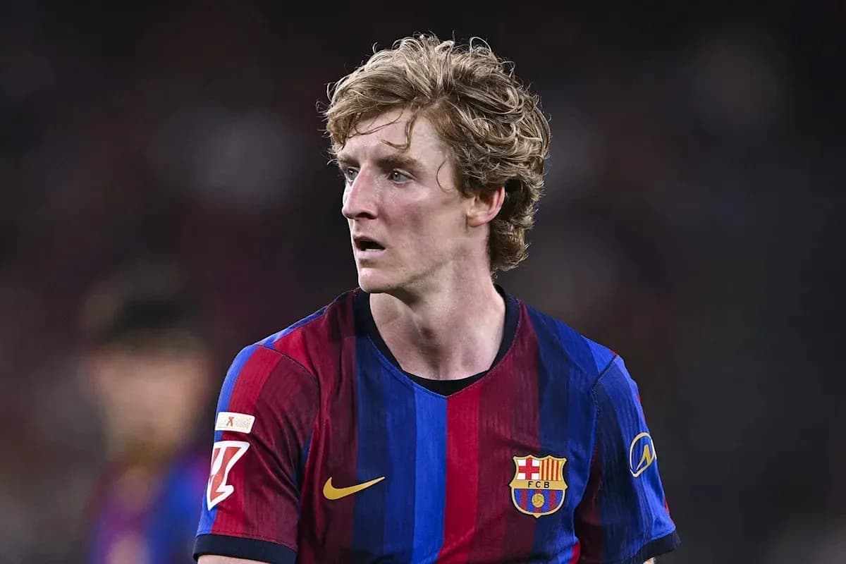 Player in FC Barcelona jersey on the field Player in FC Barcelona jersey on the field