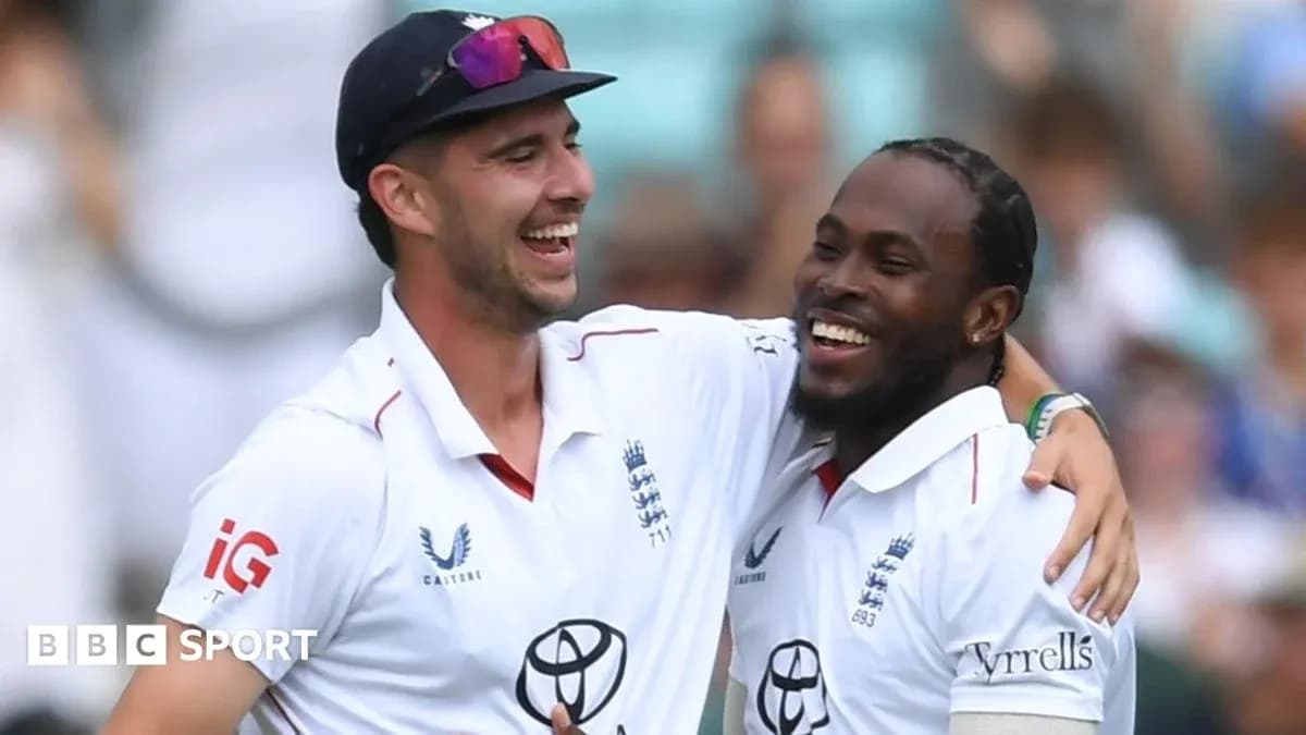 Two England cricket players celebrating on the field Two England cricket players celebrating on the field