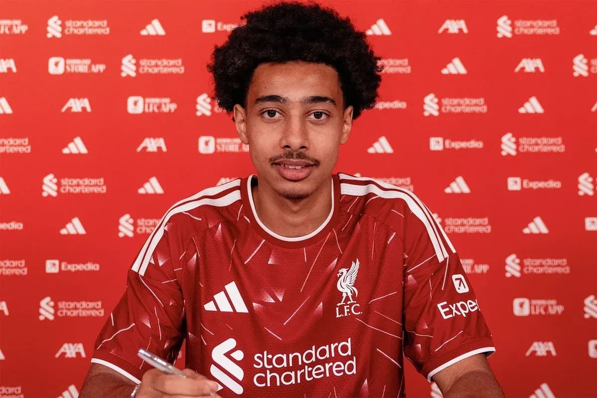Player signing contract at Liverpool FC press event Player signing contract at Liverpool FC press event