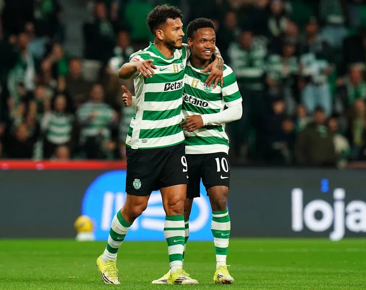Two players celebrating together on the field Two players celebrating together on the field