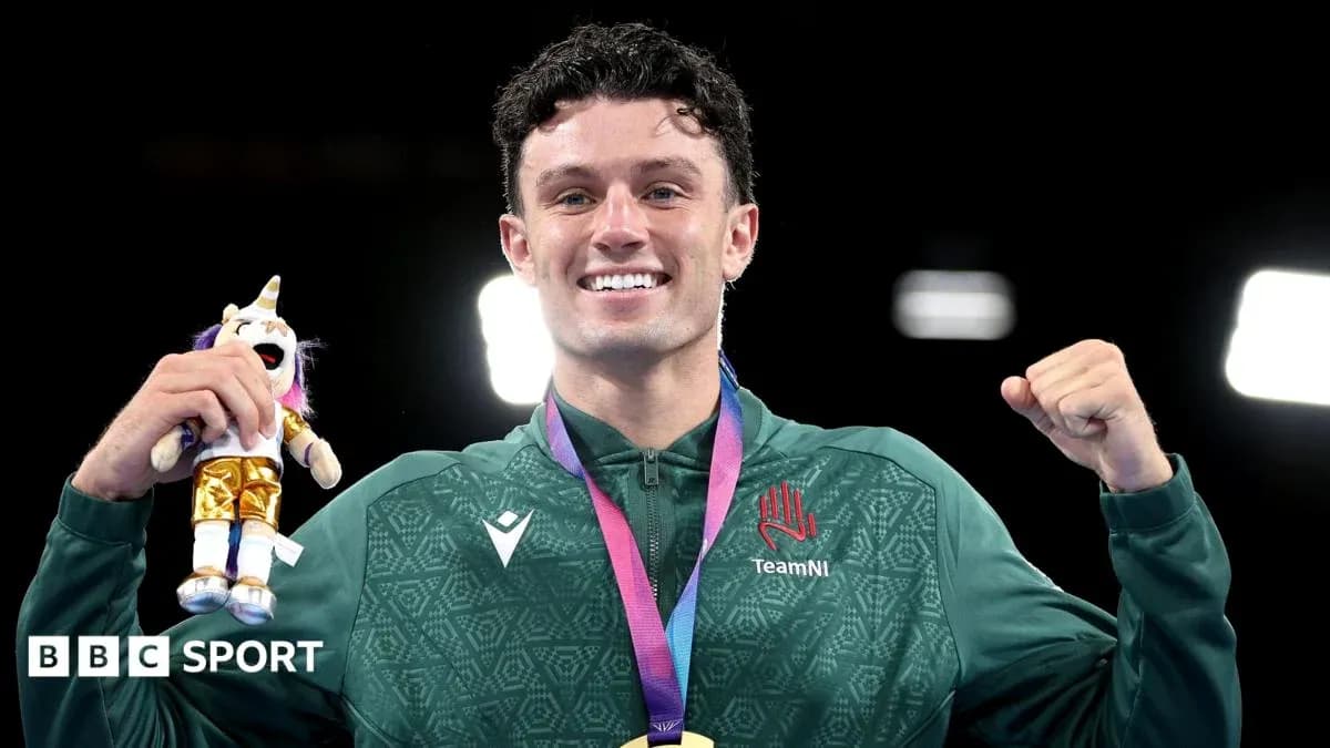 Athlete celebrating with medal and toy unicorn Athlete celebrating with medal and toy unicorn