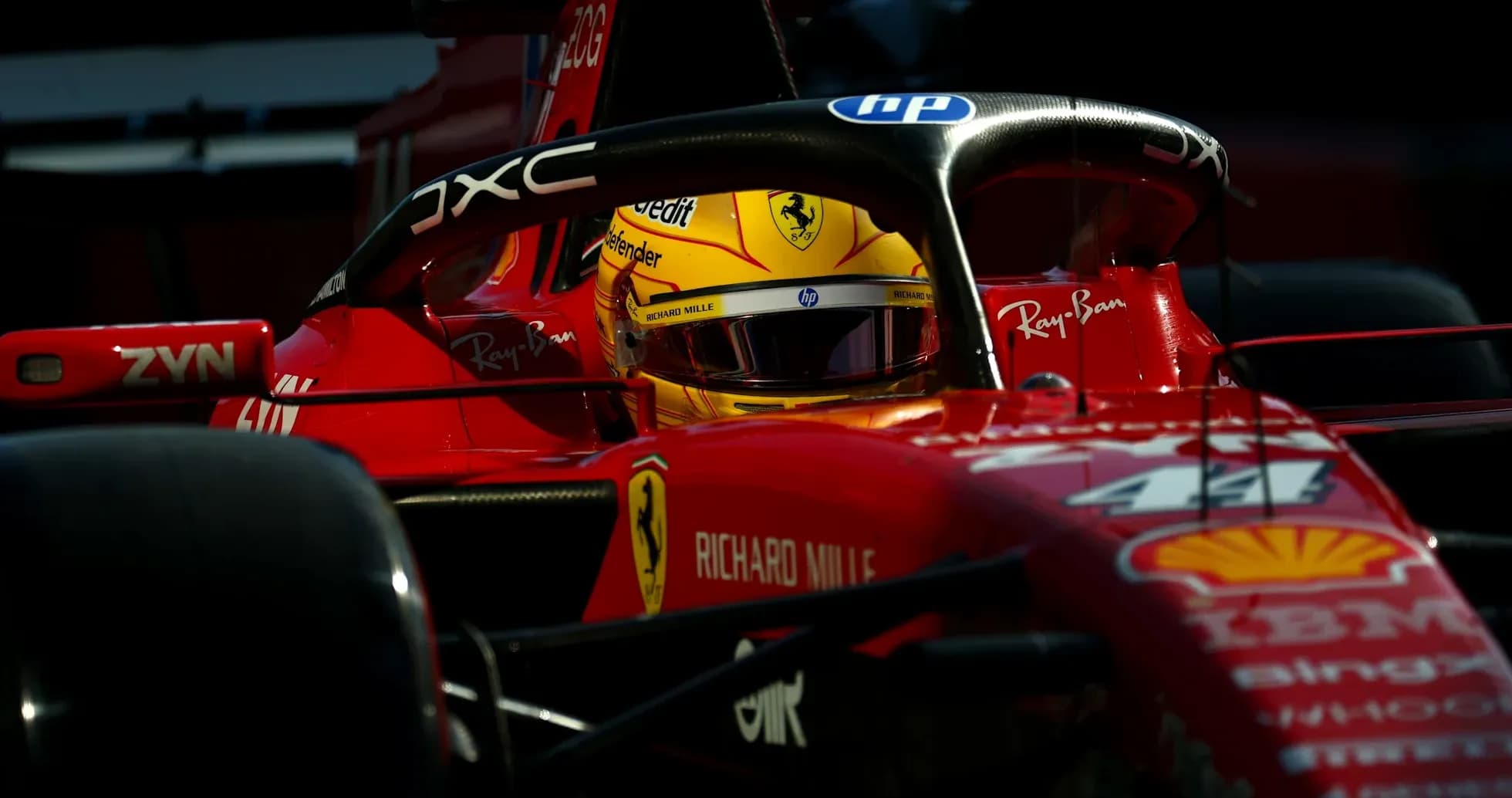 Driver in Ferrari car during a race session Driver in Ferrari car during a race session