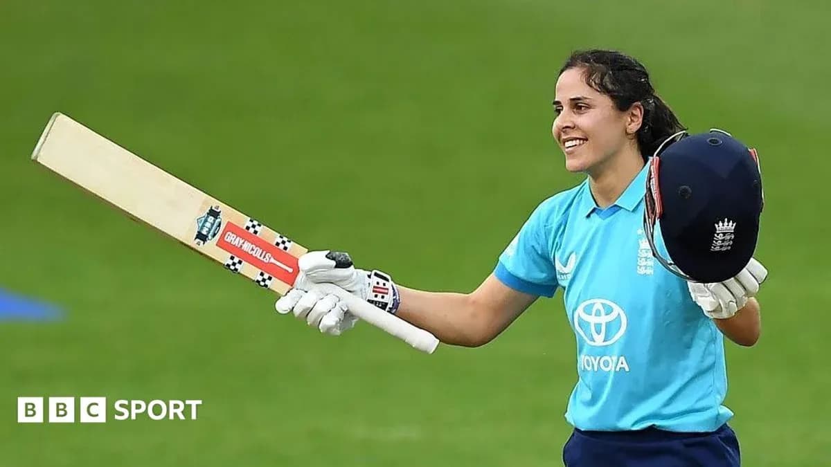 Cricketer celebrating with bat and helmet raised Cricketer celebrating with bat and helmet raised