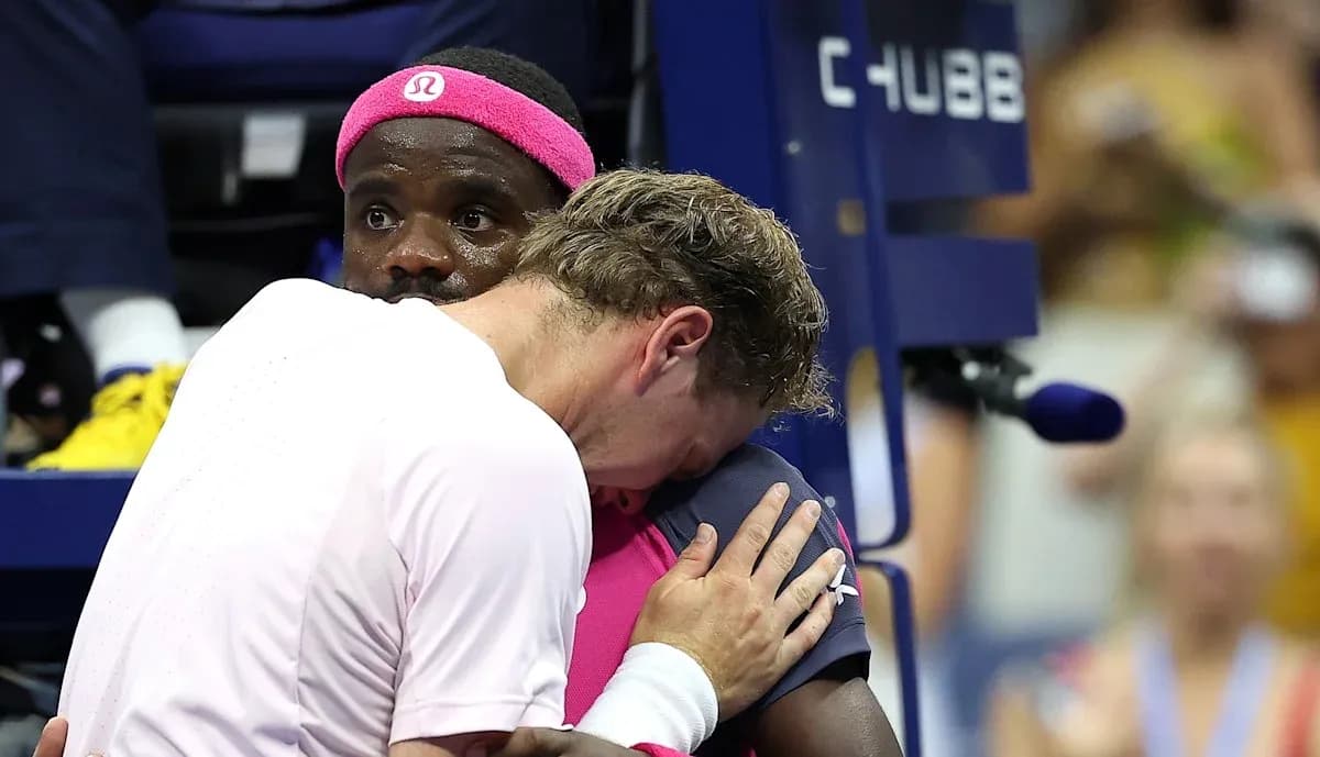 Players embracing during a tense moment in match Players embracing during a tense moment in match