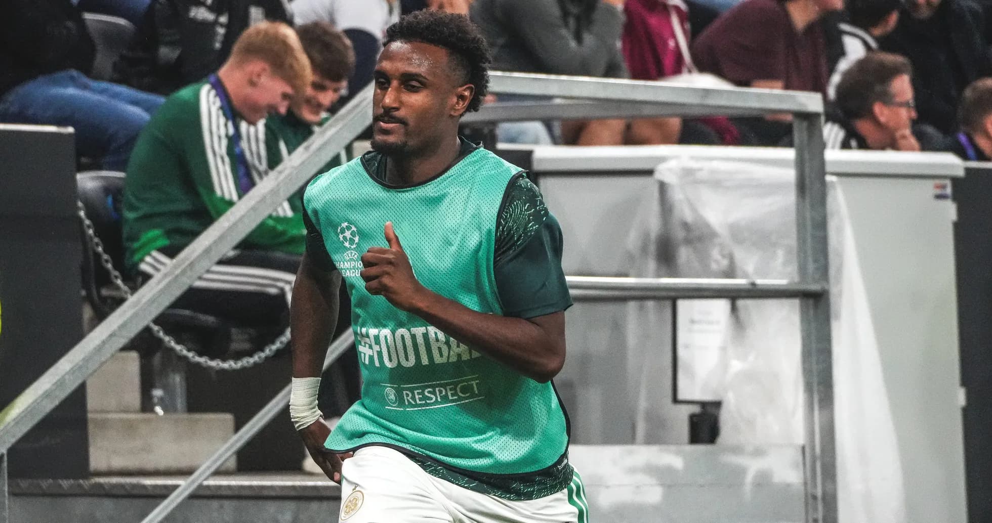 Player jogging on the sidelines during warm-up Player jogging on the sidelines during warm-up