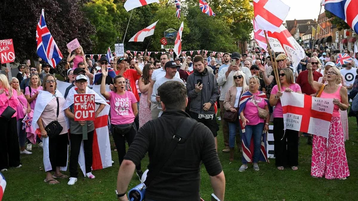 Crowd protesting with flags and signs in park Crowd protesting with flags and signs in park
