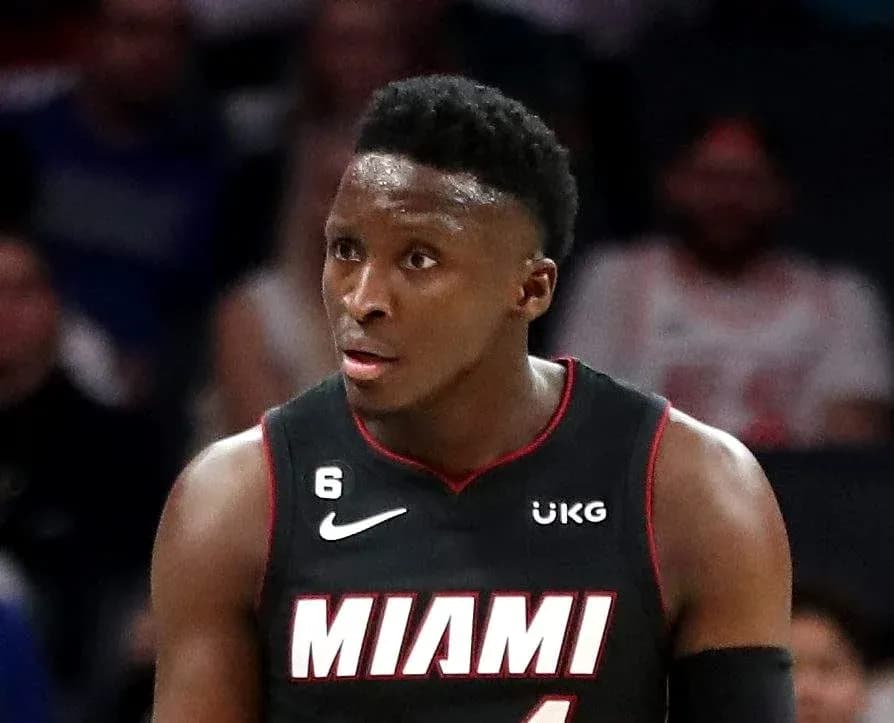 Player in Miami Heat jersey during game action Player in Miami Heat jersey during game action
