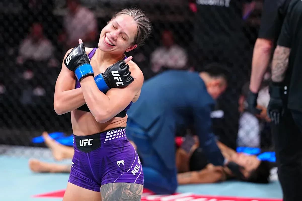 Fighter celebrating victory after MMA match Fighter celebrating victory after MMA match