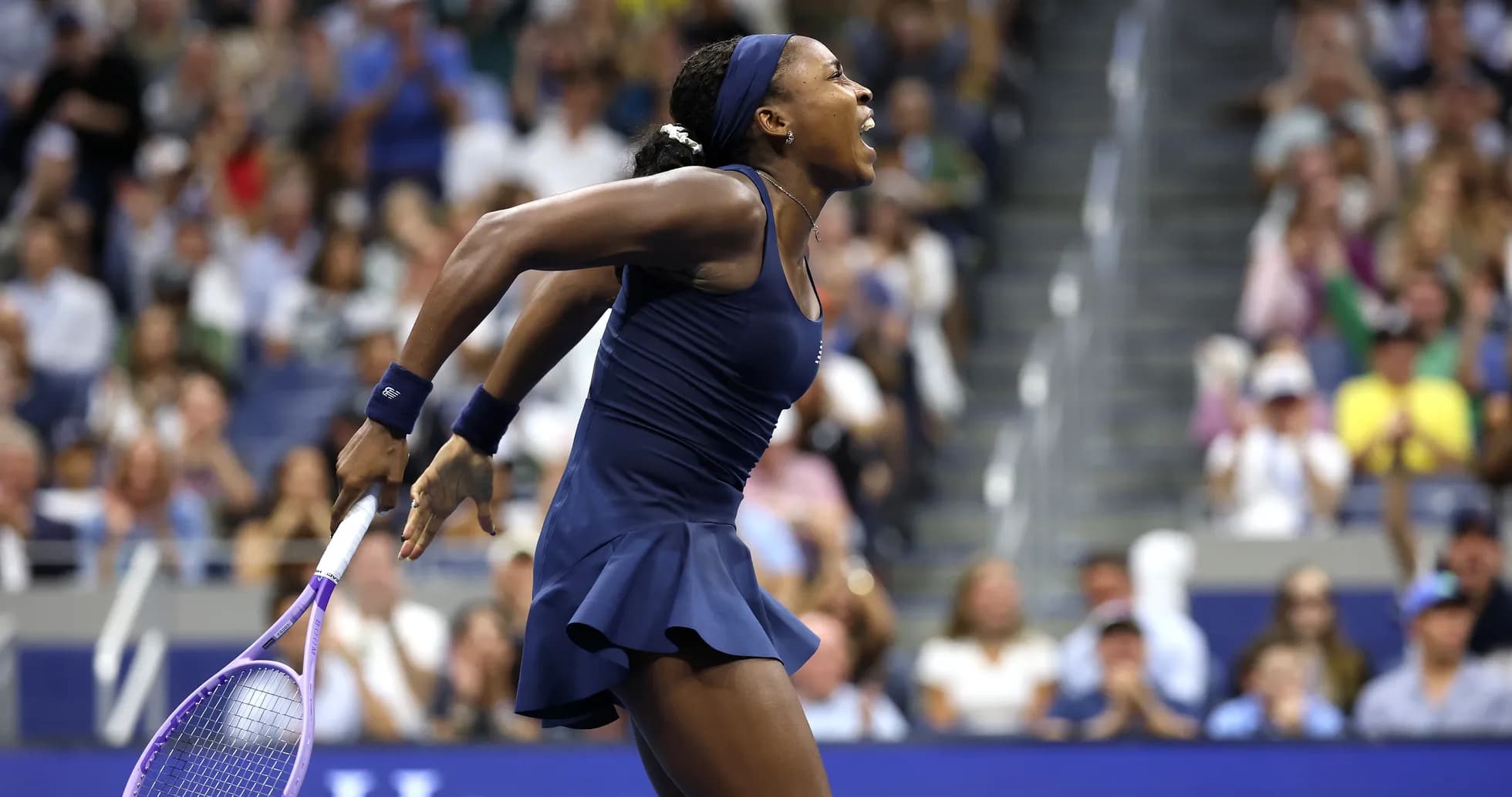 Player celebrating during US Open tennis match Player celebrating during US Open tennis match