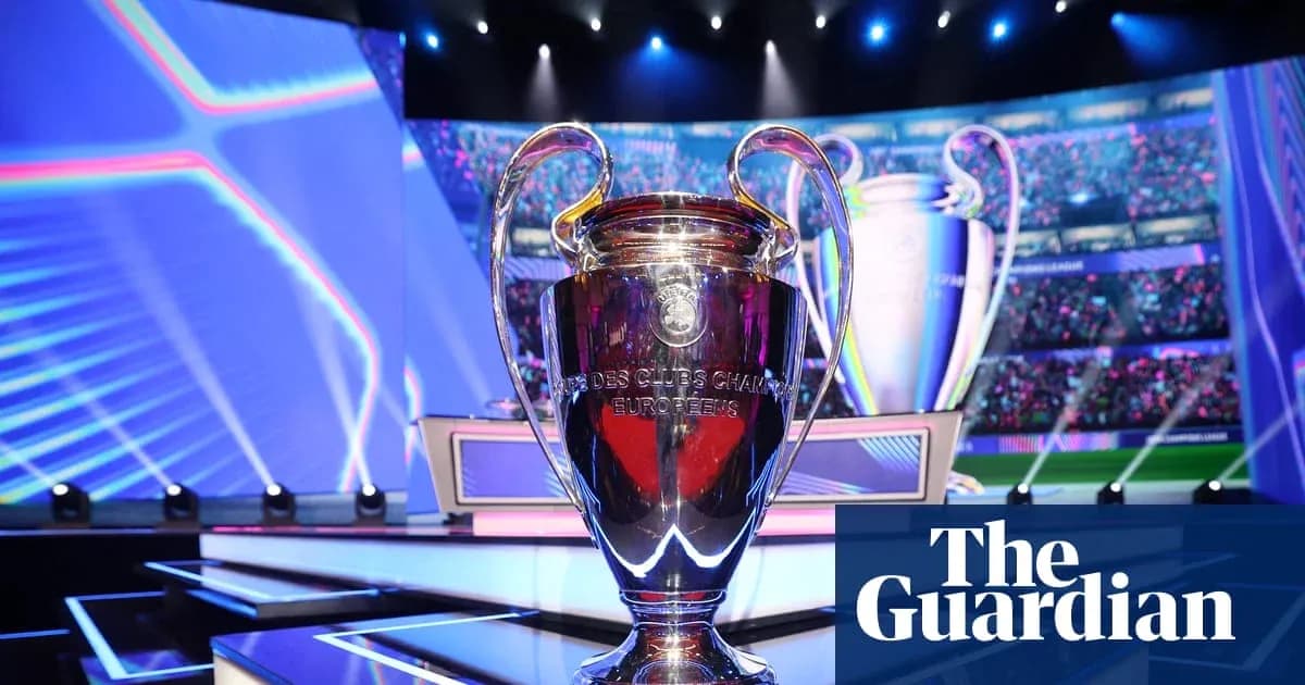 UEFA Champions League trophy displayed on stage UEFA Champions League trophy displayed on stage