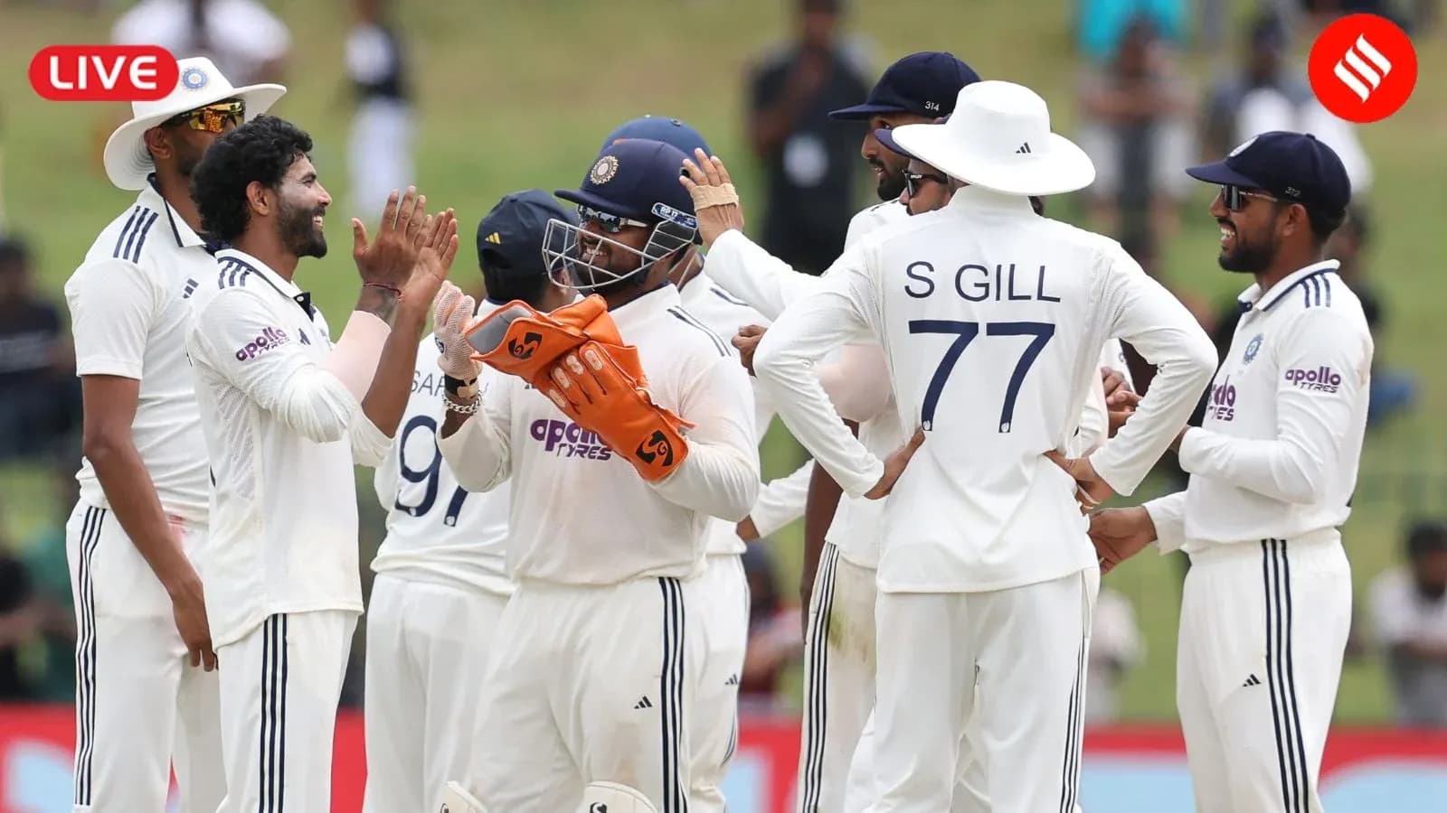 Indian cricket team celebrating a wicket on field Indian cricket team celebrating a wicket on field