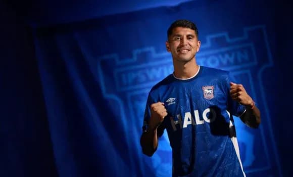 Player posing in Ipswich Town jersey with logo Player posing in Ipswich Town jersey with logo
