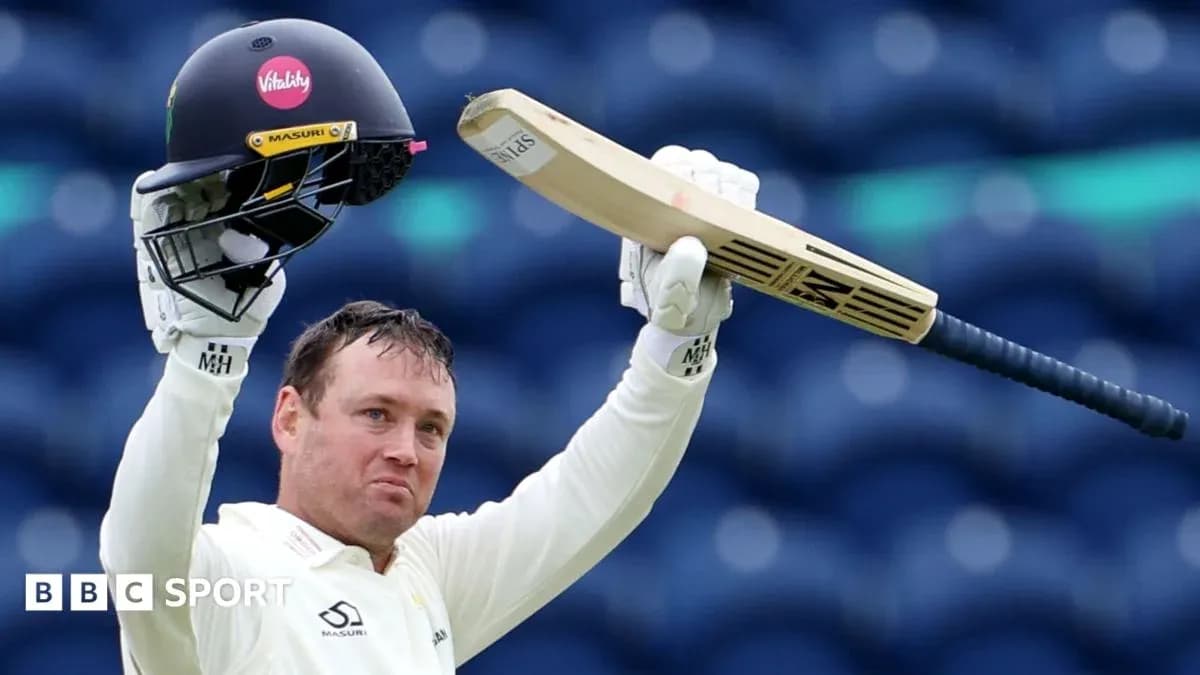 Cricketer celebrating with bat and helmet raised Cricketer celebrating with bat and helmet raised