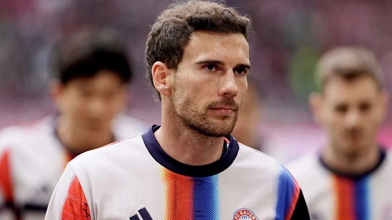 Player walking onto the pitch before the match Player walking onto the pitch before the match