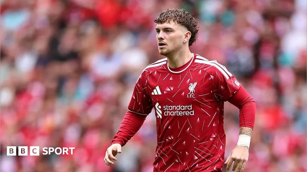 Liverpool player in red kit during match Liverpool player in red kit during match