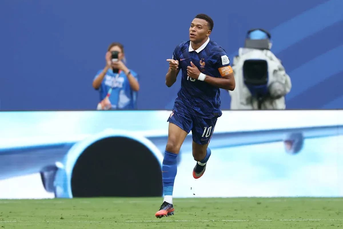 Player celebrating goal during match in blue uniform Player celebrating goal during match in blue uniform