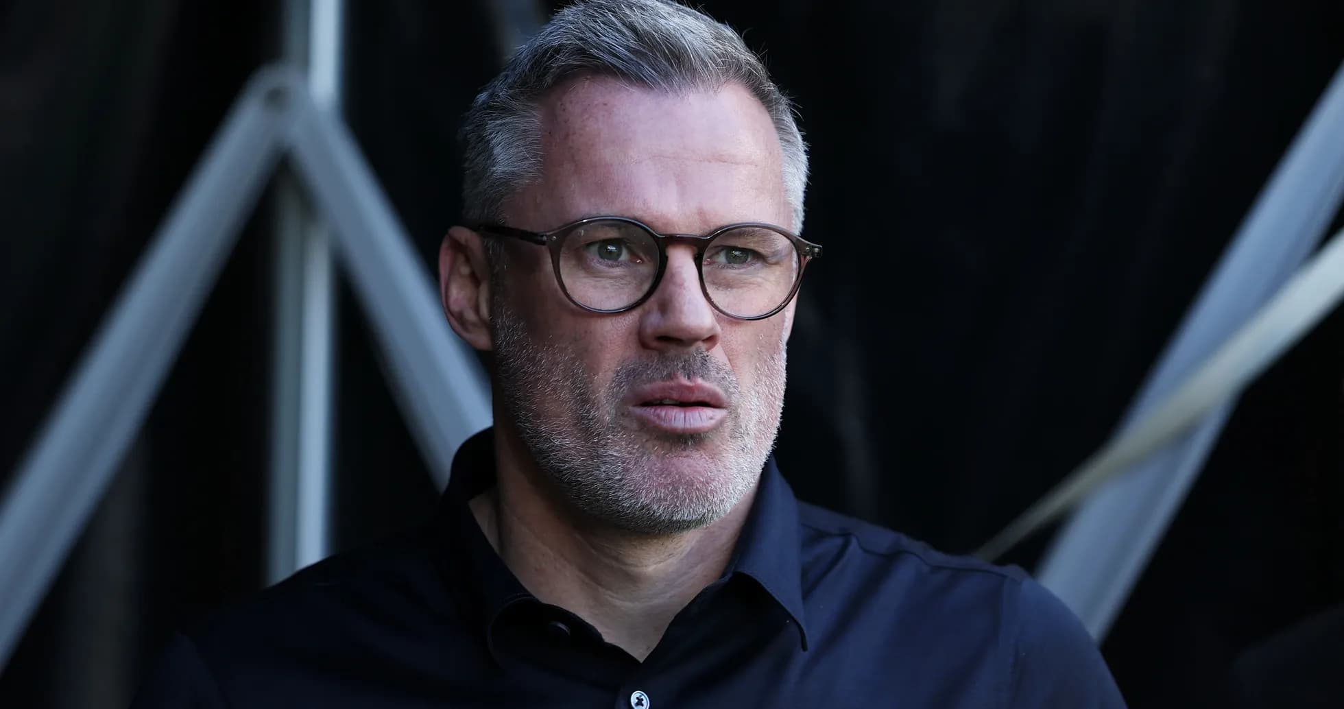 Man with glasses looking thoughtfully off-camera Man with glasses looking thoughtfully off-camera