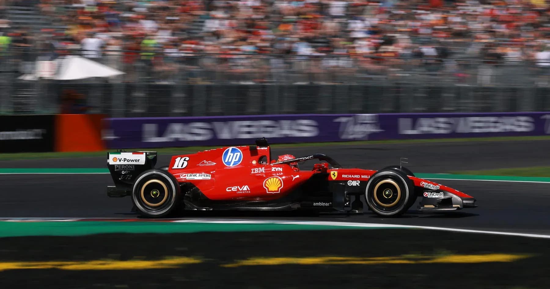 Ferrari Formula 1 car racing on track Ferrari Formula 1 car racing on track